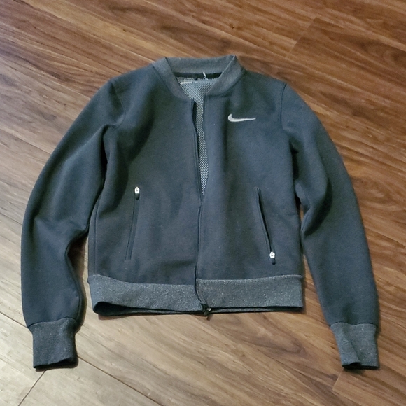Nike Jackets & Blazers - Nike Women's Dark Gray Golf Jacket with Swoosh Zippered Pockets